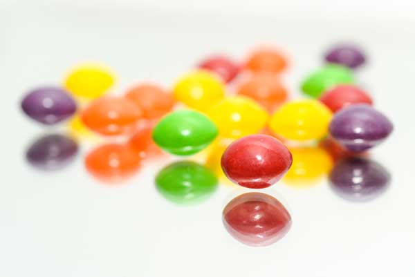 Skittles have red, yellow, blue dyes in them and are super unhealthy.